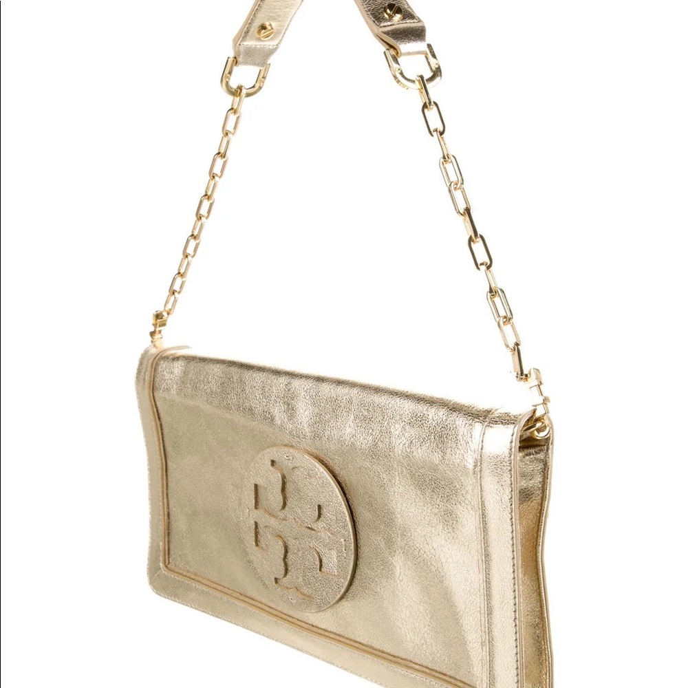 Gold rectangular shaped Tory Burch shoulder bag